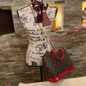 Louis Vuitton Alma Handbag